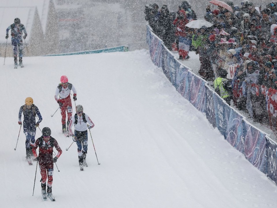 Athletes compete under a heavy snowfall during a ski mountaineering men's sprint heat 3, at the 2026 Winter Olympics, in Bormio, Italy, Thursday, Feb. 19, 2026. (AP Photo/Gabriele Facciotti)

- 2026 Winter Olympic Games;Winter Olympic games;Olympic games;Sports;Events;XXV Olympiad;Olympics 2026;Milan Cortina Olympics;Winter Olympics 2026;Milan Cortina Winter Olympics;2026 Milan Cortina Olympic Games;Olympics;Winter Games