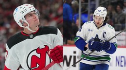 Šimon Nemec a Quinn Hughes.