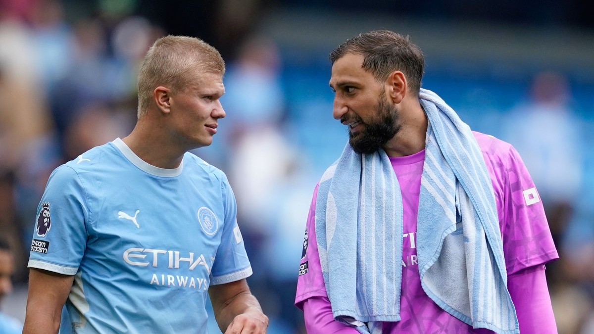 Erling Haaland a Gianluigi Donnarumma.