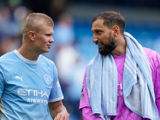 Erling Haaland a Gianluigi Donnarumma.