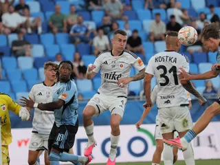 Na snímke vpravo Alexej Maroš (Slovan) dáva gól na 2:0 počas zápasu 4. kola futbalovej Niké Ligy ŠK Slovan Bratislava - MFK Ružomberok.