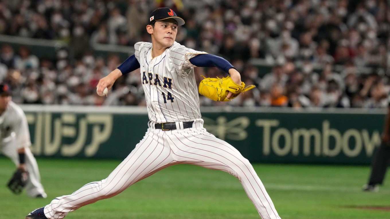 FILE - Japan's Roki Sasak pitches during a Pool B game against the Czech Republic at the World Baseball Classic at the Tokyo Dome, Japan, Saturday, March 11, 2023. (AP Photo/Eugene Hoshiko, File)