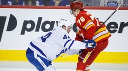 Morgan Rielly a Martin Pospíšil.