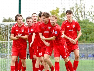 Druhý sprava Andrej Pollák v drese Sabinova.