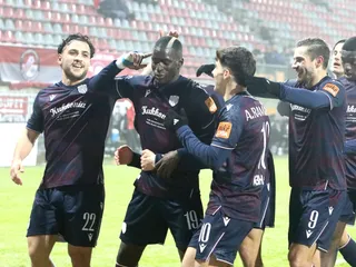 Na snímke hráči Dunajskej Stredy sa teší z gólu počas zápasu 18. kola.