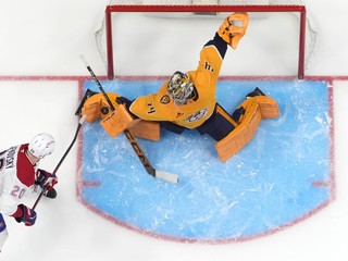 Brankár Juuse Saros (74) chytil zakončenie Juraja Slafkovského (20).