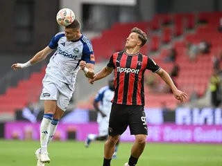 Hráč Trnavy David Polťák a hráč Michaloviec Polydefkis Volanakis počas zápasu 4. kola futbalovej Niké ligy medzi FC Spartak Trnava - MFK Zemplín Michalovce.