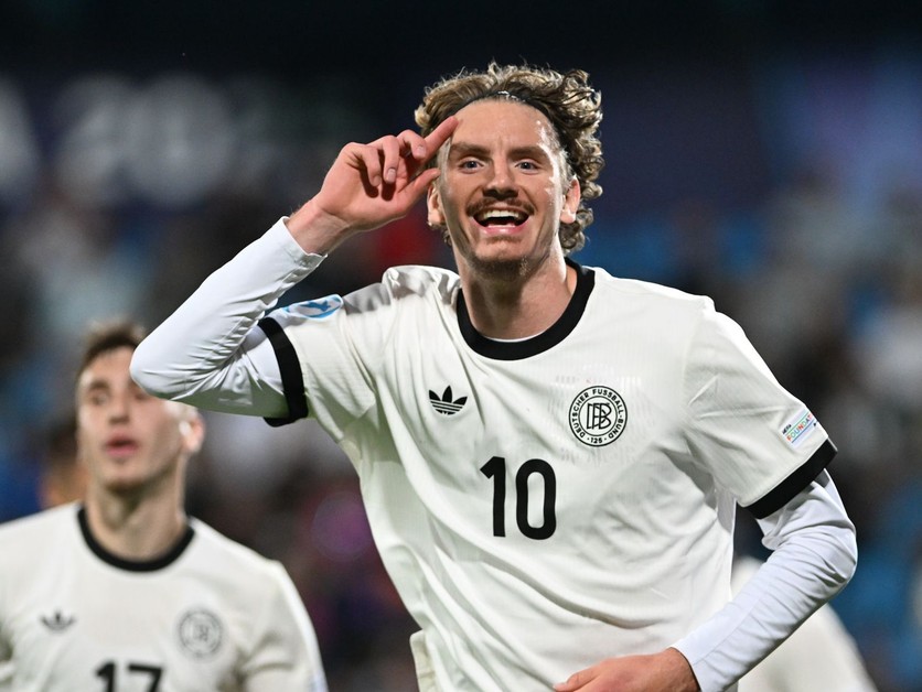 Nemecký útočník Nick Woltemade strieľa gól v zápase proti Slovinsku na EURO U21 2025.