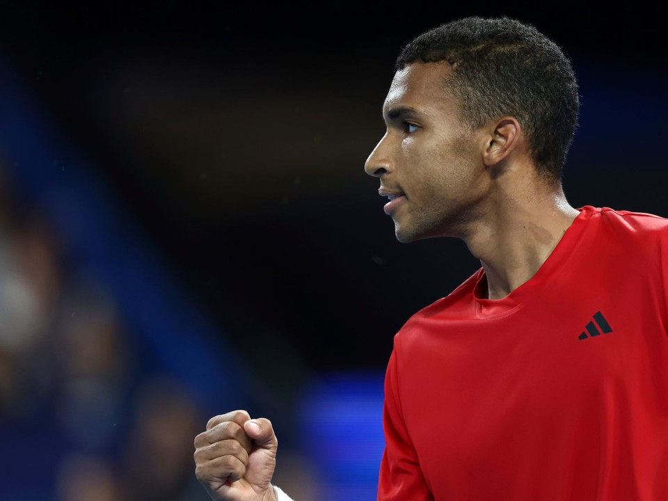 Felix Auger-Aliassime of Canada celebrates winning a crucial point from Taylor Fritz of the United States during their United Cup tennis match in Perth, Australia, Sunday, Dec. 29, 2024. (AP Photo/Trevor Collens)