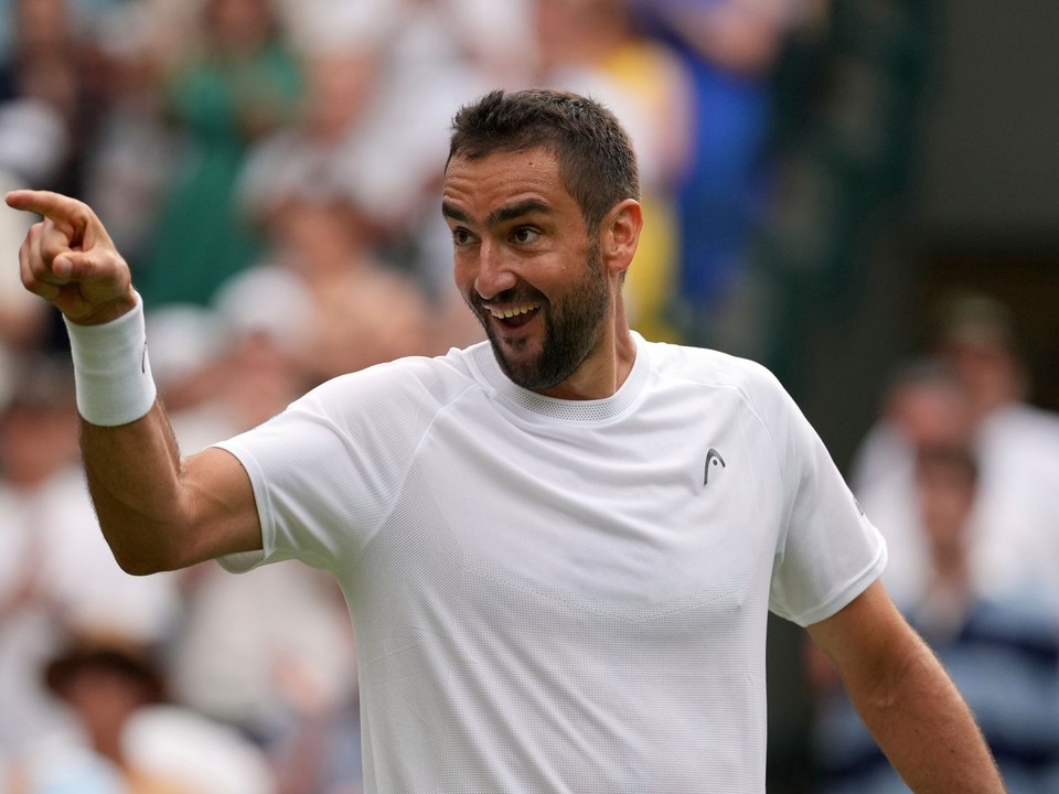 Chorvátsky tenista Marin Čilič sa teší z výhry.