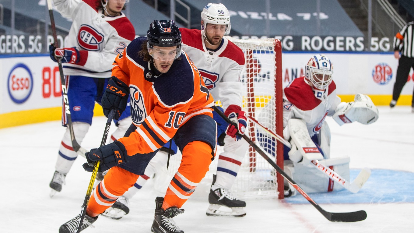 Joakim Nygard (Edmonton Oilers) a Tomáš Tatar (Montreal Canadiens) v zápase NHL.