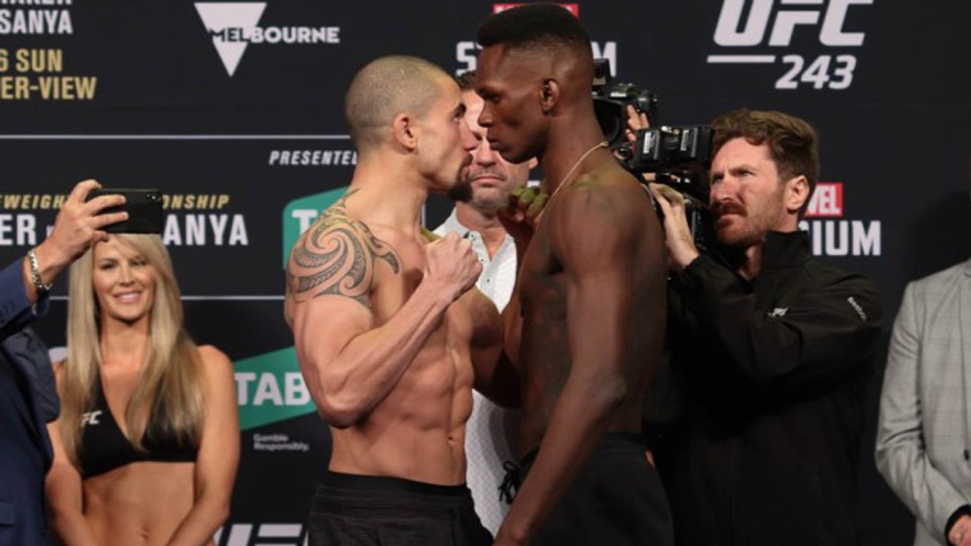 Robert Whittaker a Israel Adesanya.