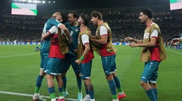 Futbalisti Iraku oslavujú gól.