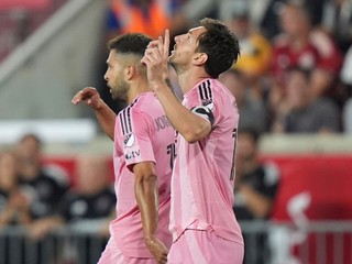Lionel Messi a Jordi Alba.
