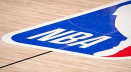 FILE - The NBA logo at center court is shown during the second half of an NBA first-round playoff basketball game between the Houston Rockets and Oklahoma City Thunder in Lake Buena Vista, Fla., Wednesday, Sept. 2, 2020. The NBA has agreed to terms on its new media deal, an 11-year agreement worth $76 billion that assures player salaries will continue rising for the foreseeable future and one that will surely change how some viewers access the game for years to come. (AP Photo/Mark J. Terrill, File)
- NBA;basketball;sports;restart;Men's basketball;Men's sports;NBA basketball;Professional basketball