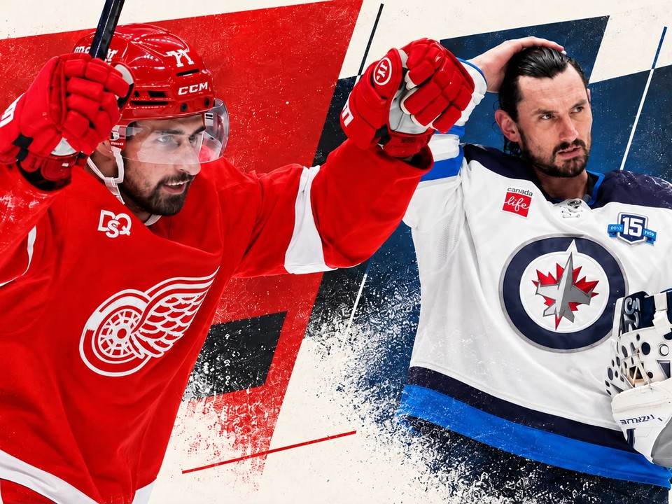 Dylan Larkin a Connor Hellebuyck. 