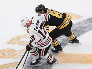 Nick Foligno a Michael Eyssimont.