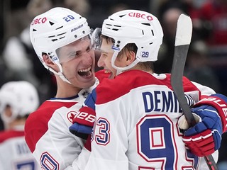 Juraj Slafkovský a Ivan Demidov.