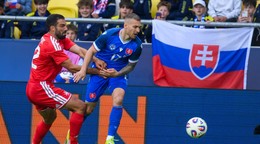 Zach Muscat (Malta) a Lukáš Haraslín (Slovensko) počas prípravného futbalového zápasu Slovensko - Malta.