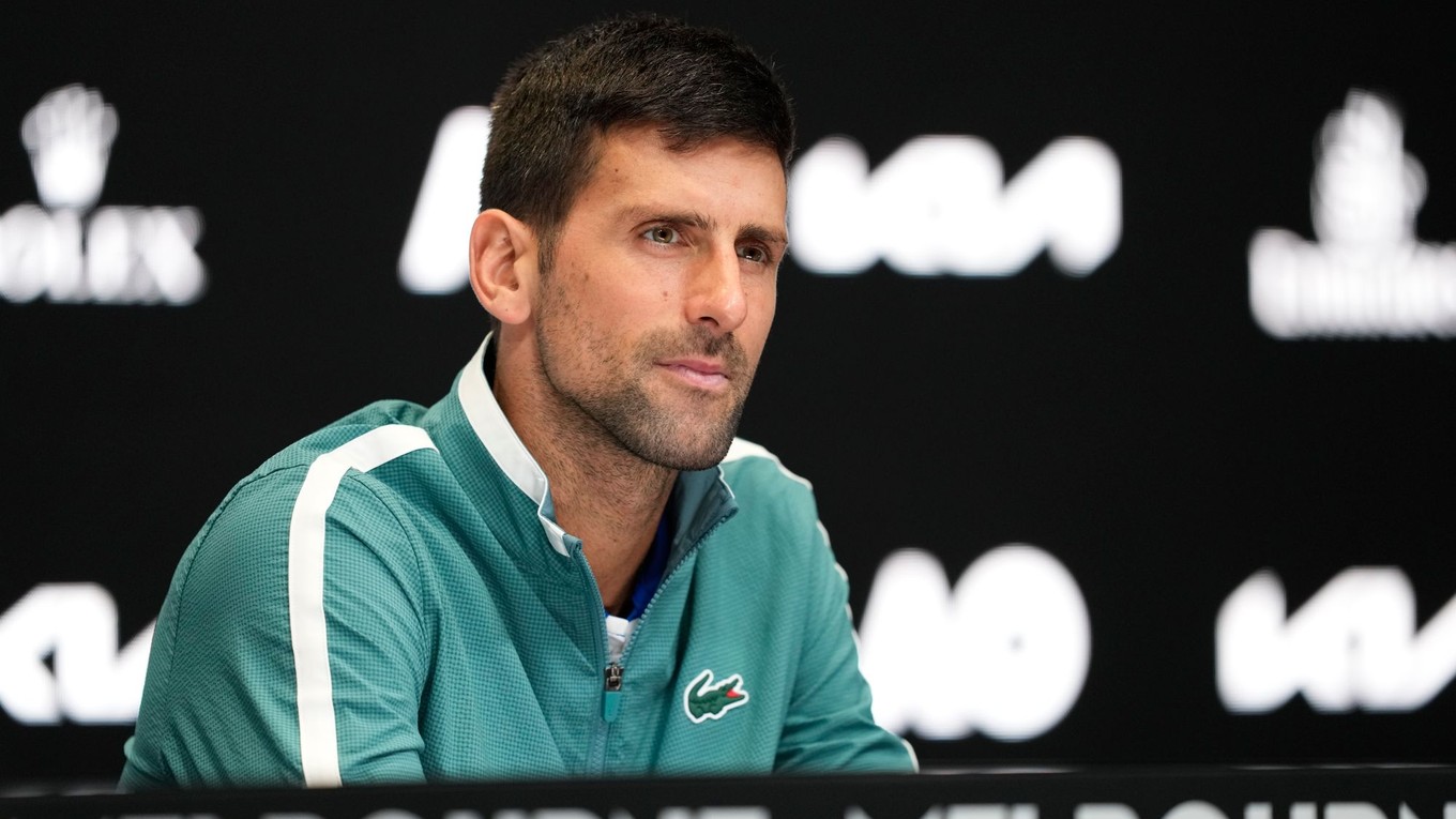 Serbia's Novak Djokovic reacts during a press conference ahead of the Australian Open tennis championships at Melbourne Park, Melbourne, Australia, Saturday, Jan. 13, 2024. (AP Photo/Alessandra Tarantino)