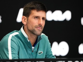 Serbia's Novak Djokovic reacts during a press conference ahead of the Australian Open tennis championships at Melbourne Park, Melbourne, Australia, Saturday, Jan. 13, 2024. (AP Photo/Alessandra Tarantino)