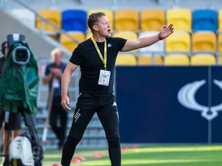 Tréner Jozef Kostelník.