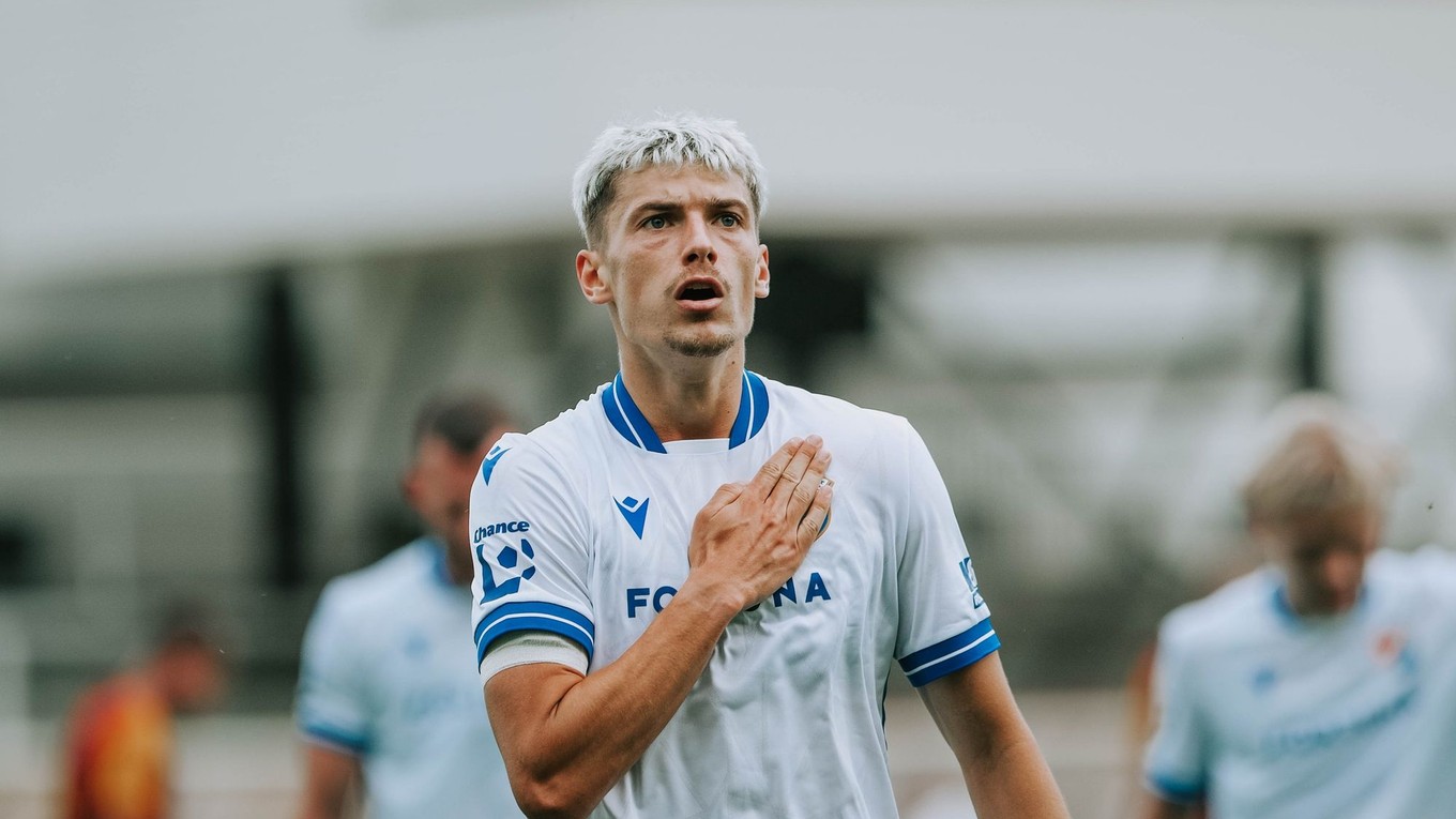 Slovenský futbalista Tomáš Rigo sa teší z gólu v drese Baníka Ostrava.