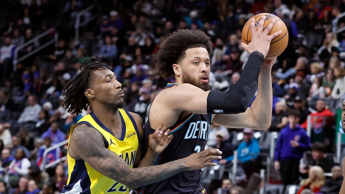 Cade Cunningham a Quenton Jackson.