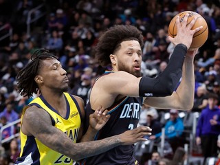 Cade Cunningham a Quenton Jackson.