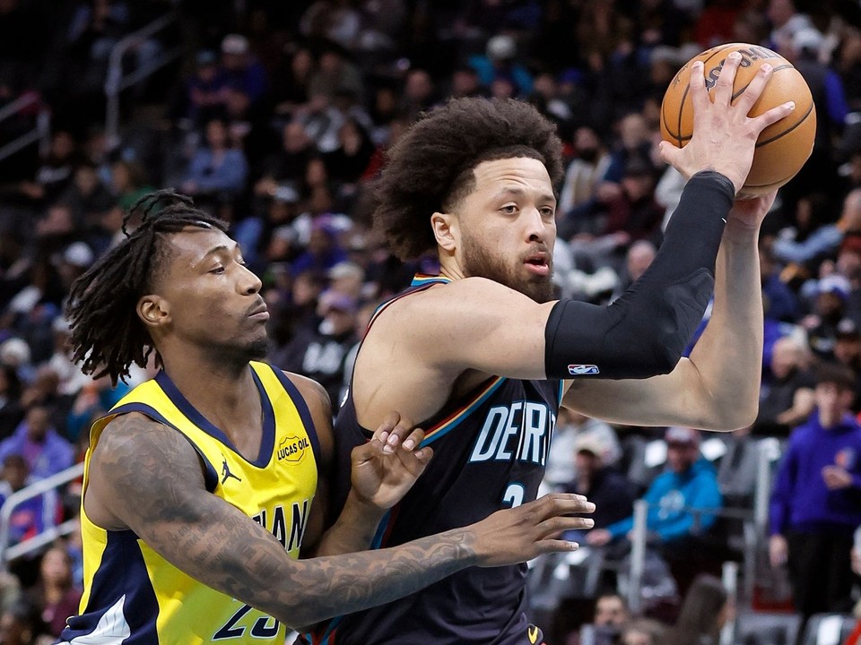 Cade Cunningham a Quenton Jackson.