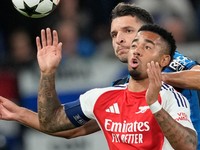 Arsenal's Gabriel Jesus, foreground, and Atalanta's Berat Djimsiti challenge for the ball during the Champions League opening phase soccer match between Atalanta and Arsenal at the Bergamo's stadium in Bergamo, Italy, Thursday, Sept. 19, 2024. (AP Photo/Antonio Calanni)

- XCHAMPIONSLEAGUEX