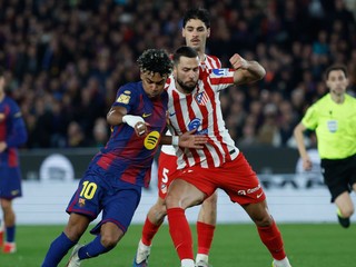 Lamine Yamal a Dávid Hancko.