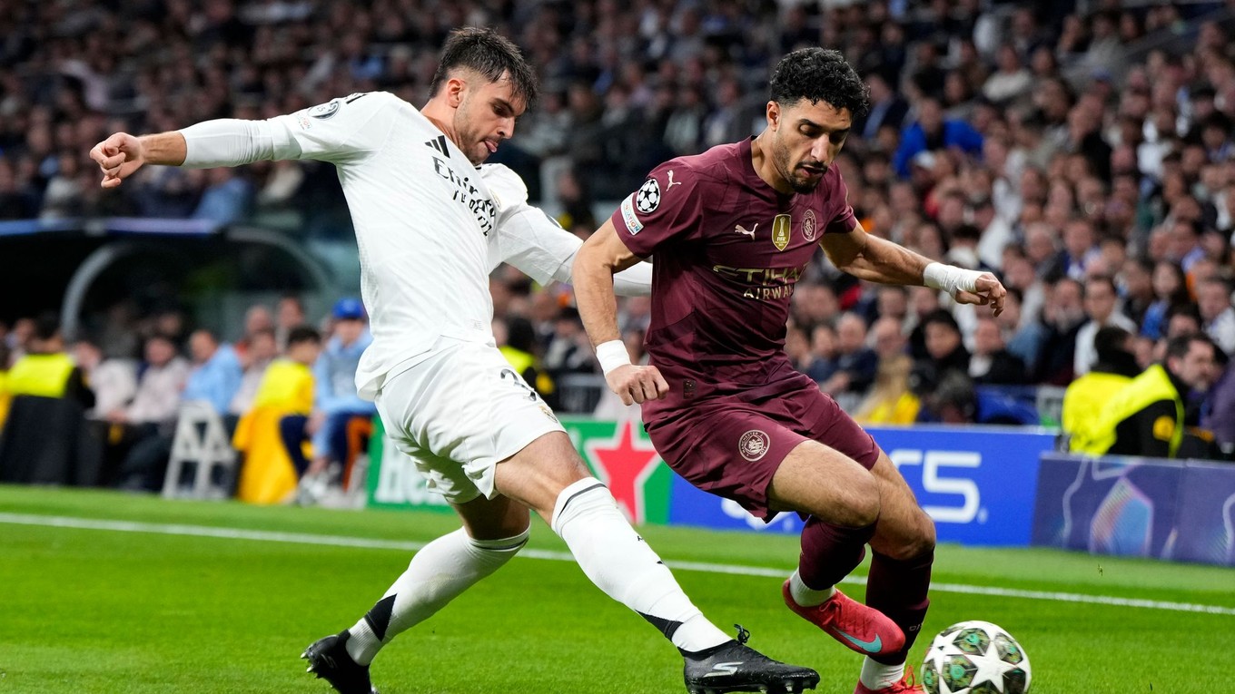 Raul Asencio a Omar Marmoush.