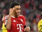 Na snímke hráč Bayernu Mníchov Jamal Musiala sa teší z úvodného gólu v zápase 1. kola ligovej fázy Ligy majstrov vo futbale Bayern Mníchov – FK Bodö/Glimt.