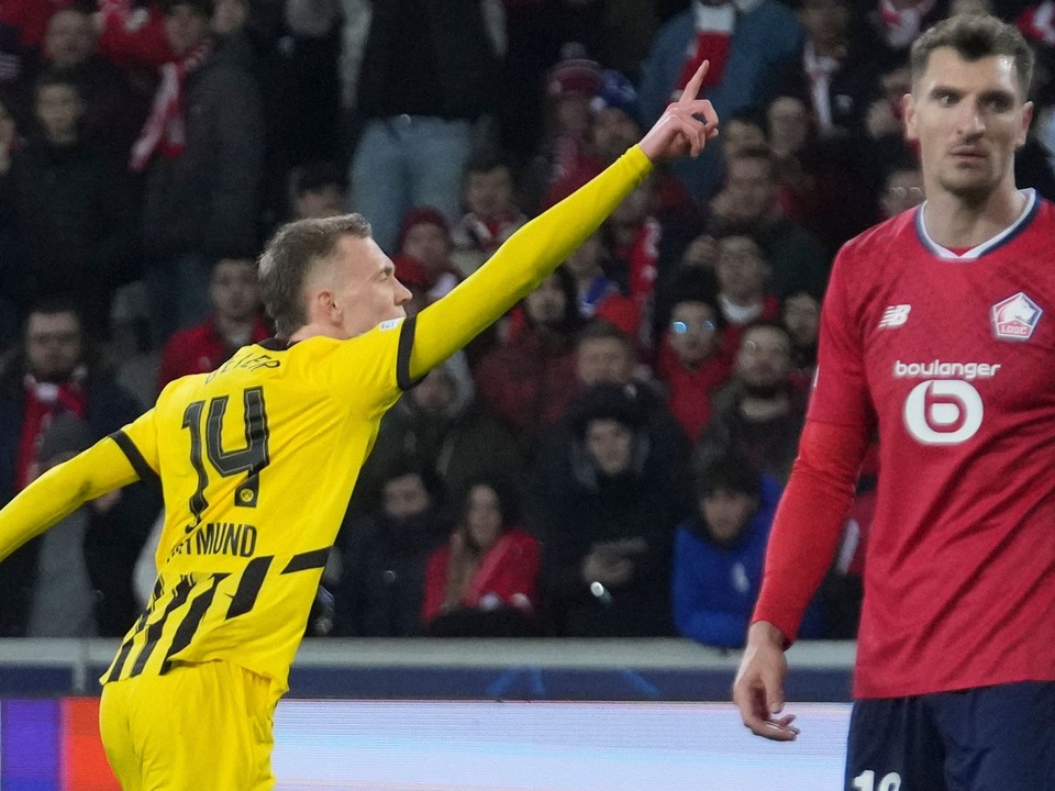 Dortmund's Maximilian Beier celebrates after scoring during the Champions League round of 16 second leg soccer match between Lille and Borussia Dortmund in Villeneuve-d'Ascq , Wednesday, March 12, 2025. (AP Photo/Michel Euler)