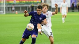 Adam Krčík (Komárno) a Filip Trello (Trnava) v zápase 2. kola futbalovej Niké ligy.