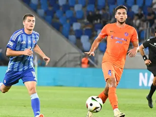 Na snímke vľavo Maxim Mateáš (Slovan) a vpravo Marco Dulca (Celje) v odvete 2. predkola futbalovej Ligy majstrov ŠK Slovan Bratislava – NK Celje .