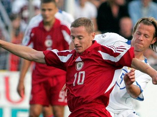 Andrejs Rubins (v strede) v drese Lotyšska v roku 2005.