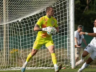 Brankár Erik Riška.