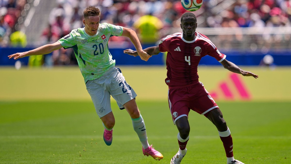 Switzerland's Michel Aebischer, left, and Qatar's Issa Laye fight for the ball during the World Cup Group B soccer match between Qatar and Switzerland in Santa Clara, Calif., near San Francisco, Saturday, June 13, 2026. (AP Photo/Eugene Hoshiko)

- Canada26
- Canada2026
- FIFA
- Mexico26
- Mexico2026
- soccer
- USA26
- USA2026
- worldcup
- worldcup26
- WorldCup2026
- futbol
- Canada26
- Canada2026
- FIFA
- Mexico26
- Mexico2026
- soccer
- USA26
- USA2026
- worldcup
- worldcup26
- WorldCup2026
- futbol