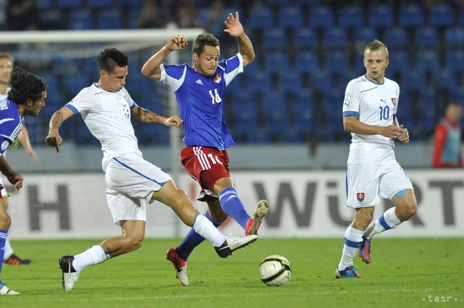 Zľava Marek Hamšík, Phillipe Erne a Marek Sapara v zápase Slovensko - Lichtenštajnsko 2:0 (Bratislava, 11.9.2012).