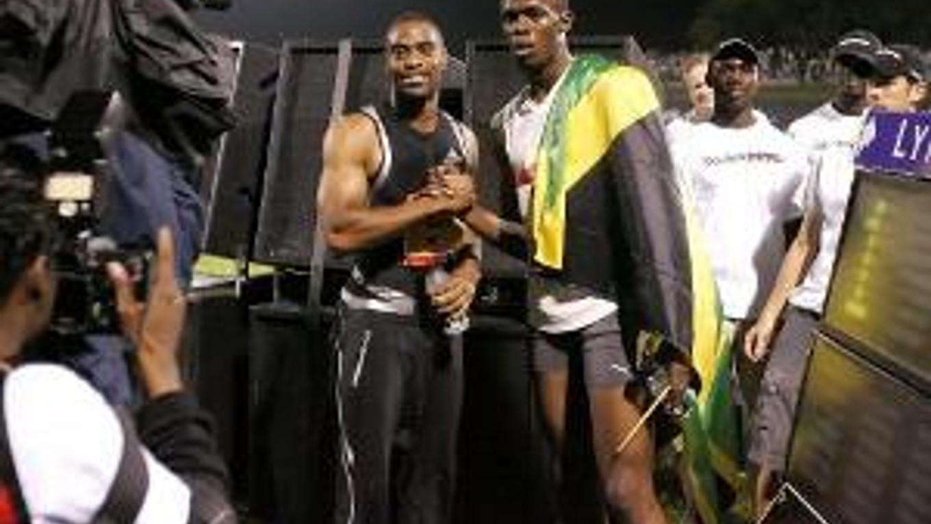 Tyson Gay s Usainom Boltom.