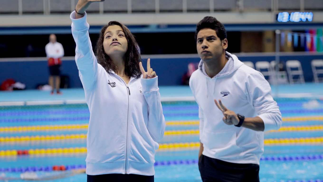 Plavci utečeneckého tímu - Yusra Mardiniová a Rami Anis.