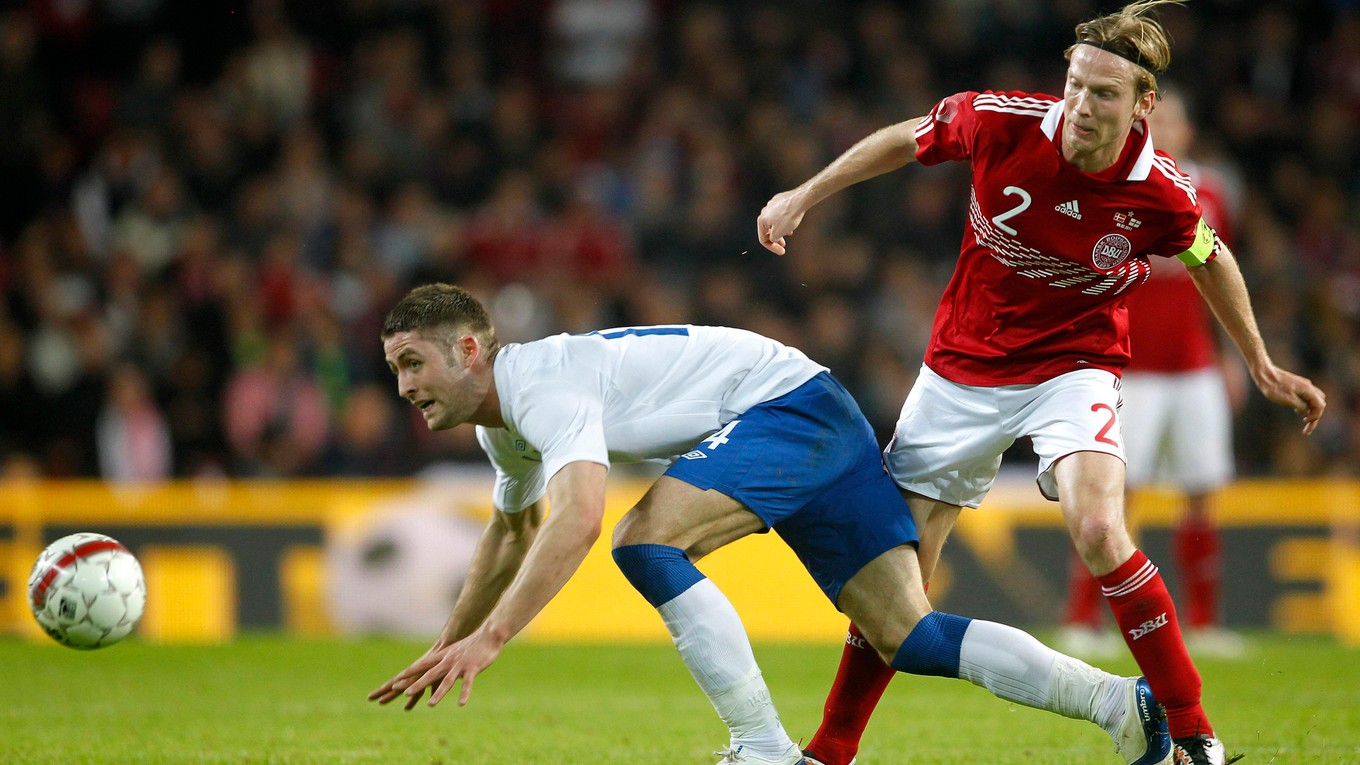 Christian Poulsen (vpravo) odohral za reprezentáciu Dánska takmer sto zápasov.