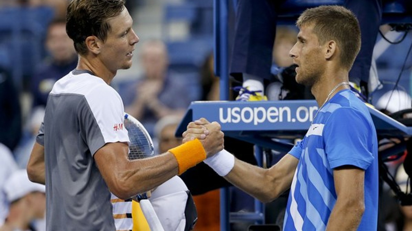 Slovenský tenista Martin Kližan (vpravo) a Čech Tomáš Berdych. Kližan je na Australian Open 32. nasadeným hráčom, Berdych je sedmička.