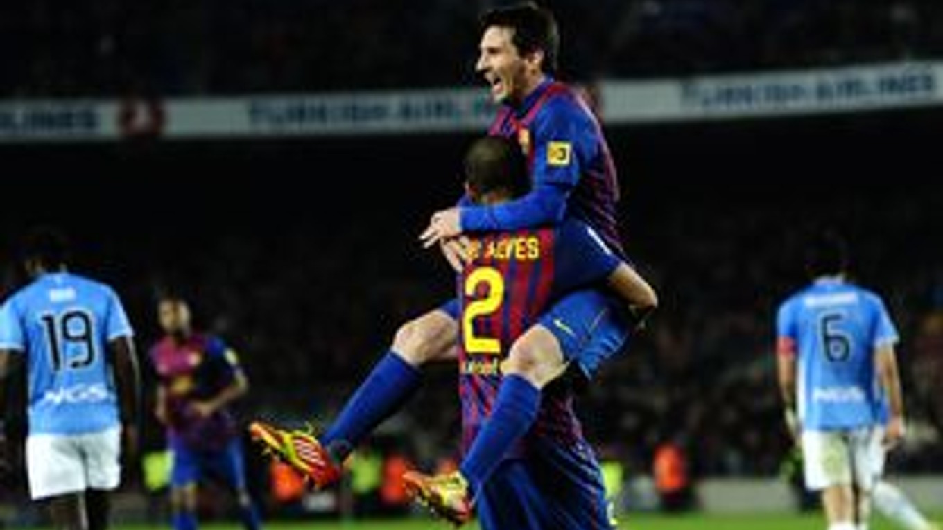 Daniel Alvés a Lionel Messi.