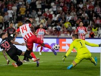 Red Star's Peter Olayinka, center, makes an attempt to score against Benfica's goalkeeper Anatoliy Trubin, right, as Benfica's Nicolas Otamendi defends during the Champions League opening phase soccer match between Red Star and SL Benfica, at the Rajko Mitic Stadium in Belgrade, Serbia, Thursday, Sept. 19, 2024. (AP Photo/Darko Vojinovic)

- XCHAMPIONSLEAGUEX