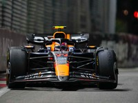 Red Bull driver Sergio Perez of Mexico steers his car during the Singapore Formula One Grand Prix at the Marina Bay Street Circuit, in Singapore, Sunday, Sept. 22, 2024. (AP Photo/Vincent Thian)

- f1autoz24