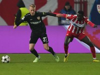 Stuttgart's Chris Fuehrich, left, and Red Star's Silas vie for the ball during the Champions League opening phase soccer match between Red Star and Stuttgart at the Rajko Mitic Stadium in Belgrade, Serbia, Wednesday, Nov. 27, 2024. (AP Photo/Darko Vojinovic)

- XCHAMPIONSLEAGUEX