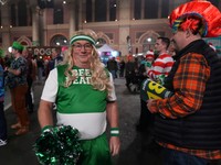 Fans arrive for the final of the World Darts Championship at Alexandra Palace in London, Friday, Jan. 3, 2025. (AP Photo/Kirsty Wigglesworth)